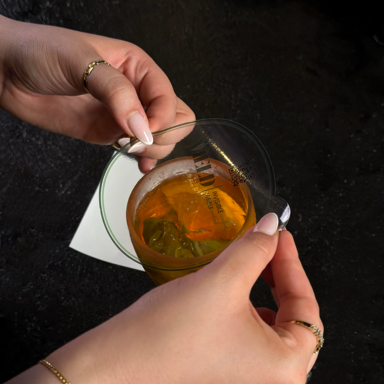 PLACE IT OVER THE DRINK.